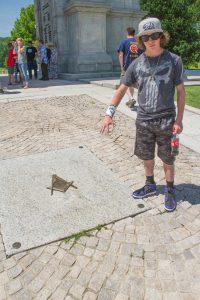 Bridger Lowery at a Masonic monument at Valley Forge