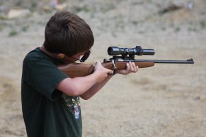 Bridger Lowery shooting .22 rifle